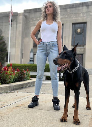 Sonia Ruiz Queens New York is often accompanied by her trained Doberman guard dog named "Shado" from her Instgram profile @shado_nyc